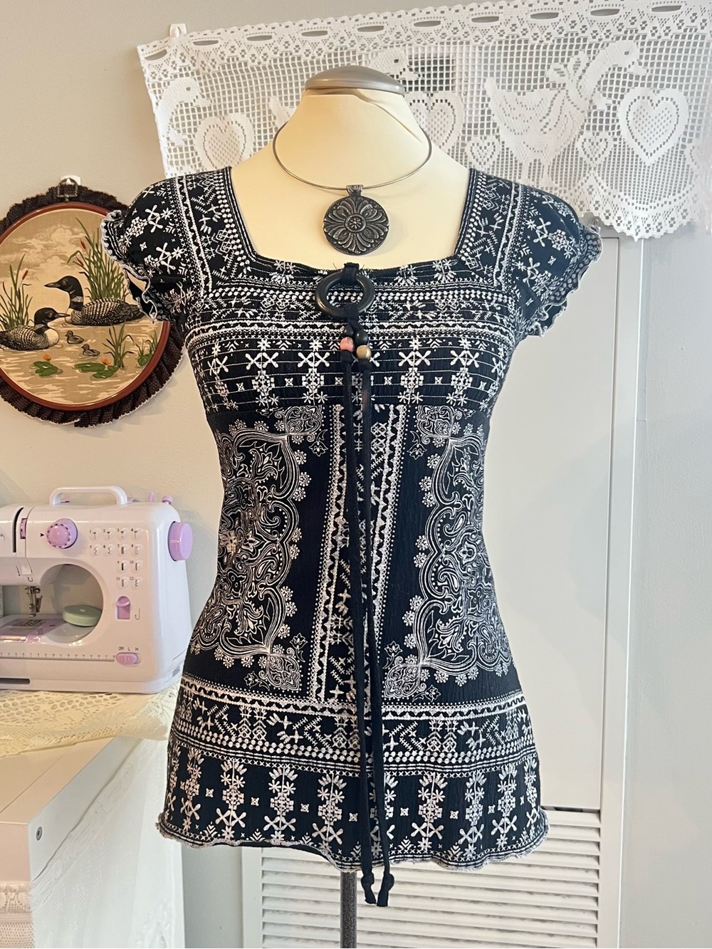 Majora black & white boho blouse with white geometric and floral patterns